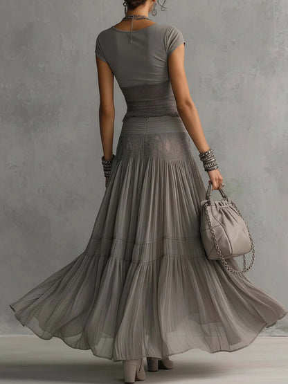 Carmen - Top Gris con transparencias, paneles de encaje y Falda Larga plisada