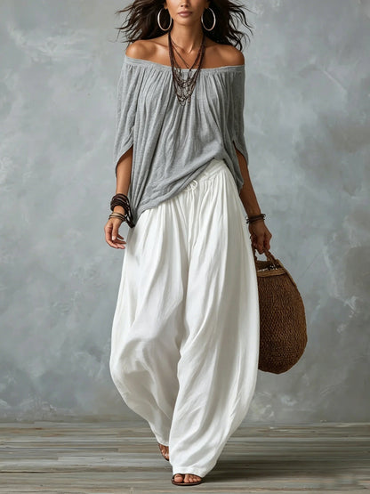 Julia - Conjunto de top en blanco con hombros descubiertos y pantalones holgados