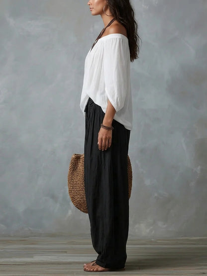Julia - Conjunto de top en blanco con hombros descubiertos y pantalones holgados